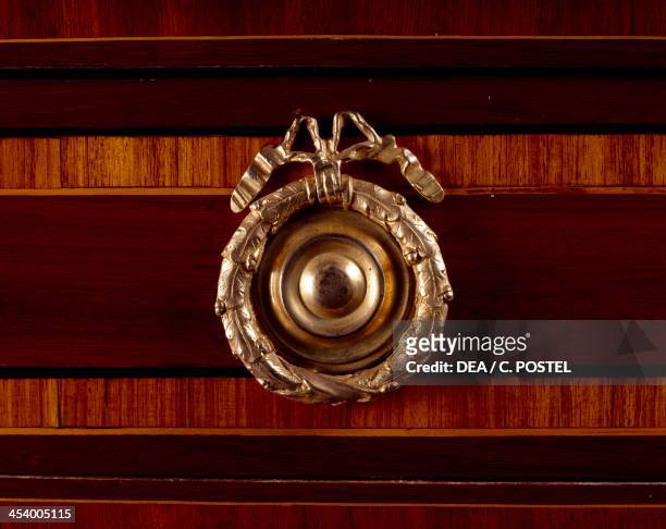 Handle, detail from Louis XVI style secretary with satinwood and tulipwood veneer finish with amaranth frames, stamped Andre-Louis Gilbert . France,...