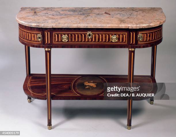 Louis XVI style dessert console table with satinwood and amaranth quarter circle insets in each corner and light wood inlays. France, 18th century.