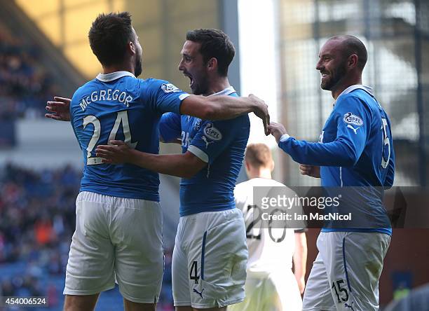 Darren McGregor celebrates with team mates Nicky Clark and Kris Boyd after he scores during the Scottish Championship League Match between Rangers...