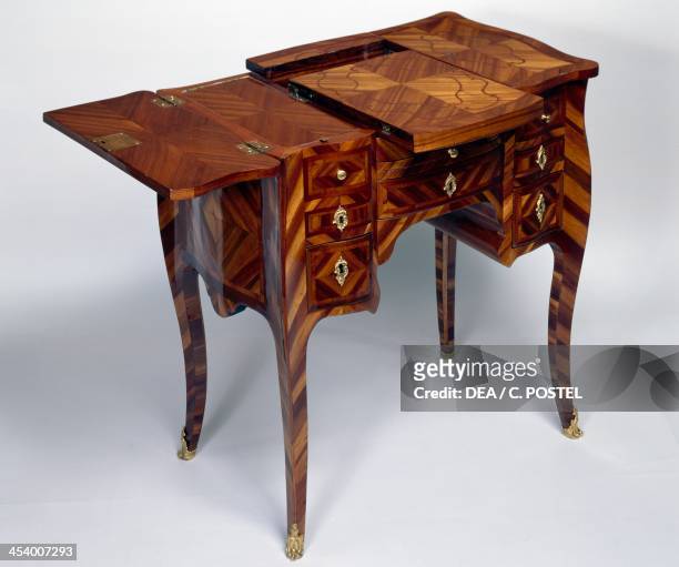 Louis XV style oak dressing table with satinwood veneer finish, triple panel top, stamped M Crieard, left leaf and open central section. France, late...