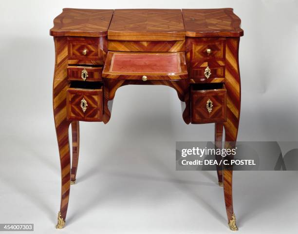 Louis XV style oak dressing table with satinwood veneer finish, triple panel top, stamped M Crieard, desk and drawers open. France, 18th century.