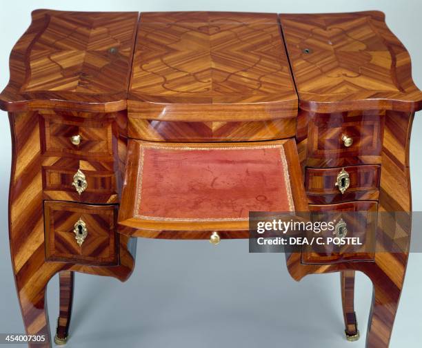 Louis XV style oak dressing table with satinwood veneer finish, triple panel top, stamped M Crieard, desk open and drawers closed. France, 18th...