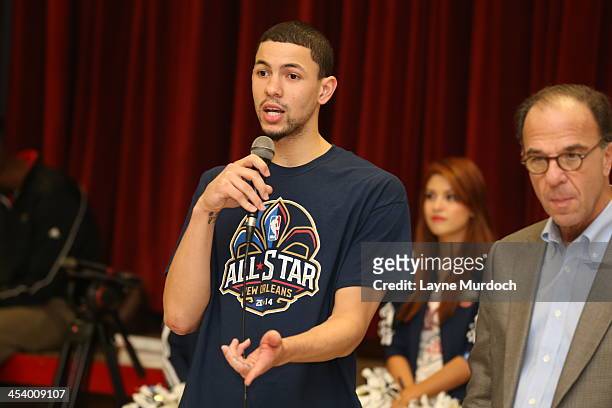 Austin Rivers of the New Orleans Pelicans speaks to elementary students and then gives each student tickets to the NBA All-Star Jam Session taking...