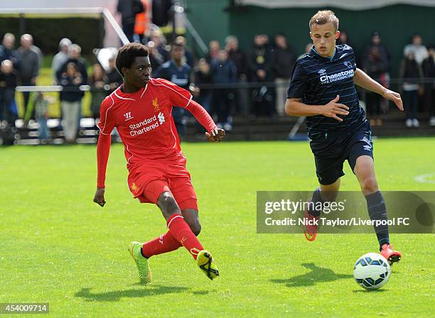 Ovie Ejaria of Liverpool and Charles Vernam of Derby County in action during the Barclays Premier League Under 18 fixture between Liverpool and Derby...