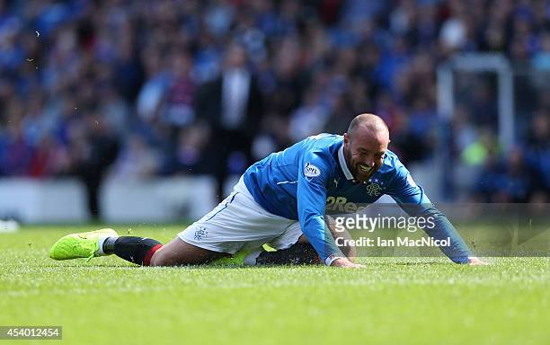 Kris Boyd of Rangers falls to the ground as he chases the ball during the Scottish Championship League Match between Rangers and Dumbarton, at Ibrox...