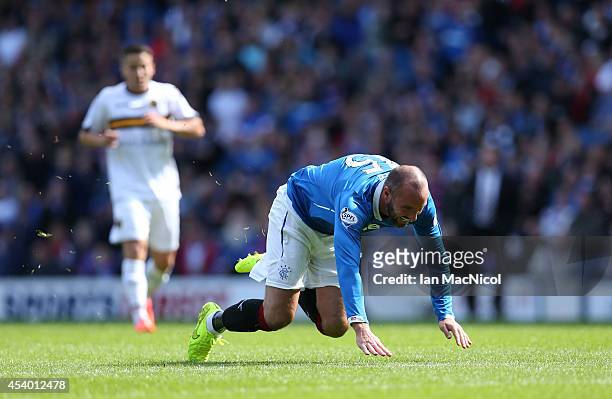 Kris Boyd of Rangers falls to the ground as he chases the ball during the Scottish Championship League Match between Rangers and Dumbarton, at Ibrox...