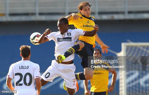 Gabriel Alejandro Paletta of Parma competes for the ball with Jerry Mbakogu of Carpi FC at Stadio Sandro Cabassi on August 23, 2014 in Carpi, Italy.
