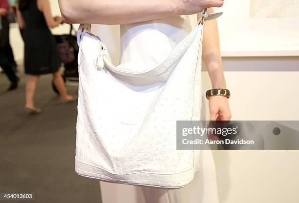 Elizabeth TenHouten , wearing a vintage Gucci purse, GURHAN jewelry and a BCBG dress, attends Art Basel Miami Beach 2013 at the Miami Beach...