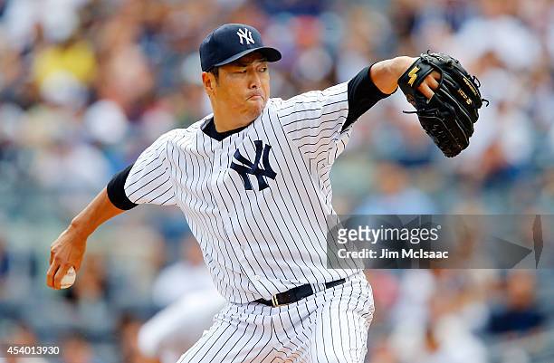 Hiroki Kuroda of the New York Yankees pitches in the first inning against the Chicago White Sox at Yankee Stadium on August 23, 2014 in the Bronx...