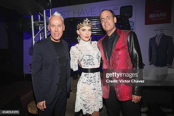 Guest, Belinda and Edy Smol pose to photographers during the EstiloDF 3rd anniversary at Joy Room on November 27, 2013 in Mexico City, Mexico.