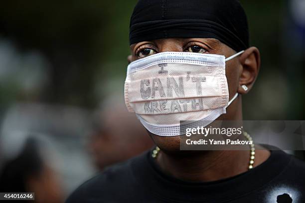 Born Sun marches during a rally against police violence on August 23, 2014 in the Staten Island borough of New York City. Thousands of marchers are...