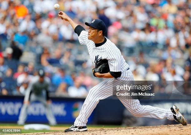 Hiroki Kuroda of the New York Yankees pitches in the third inning against the Chicago White Sox at Yankee Stadium on August 23, 2014 in the Bronx...