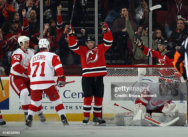 Andy Greene of the New Jersey Devils celebrates his powerplay goal at 13:43 of the first period against Jonas Gustavsson of the Detroit Red Wings at...