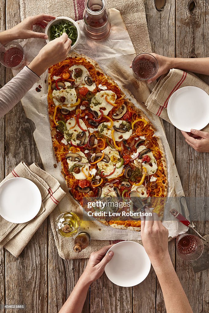 People eating pizza