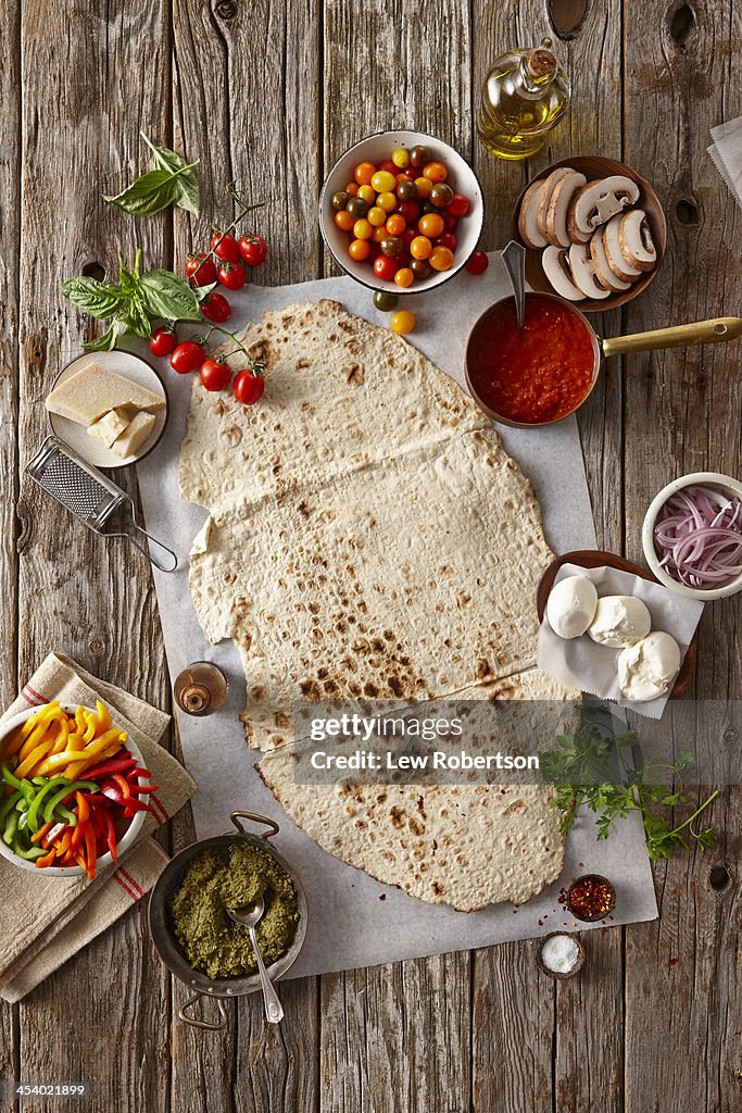 Preparation of making flatbread pizza