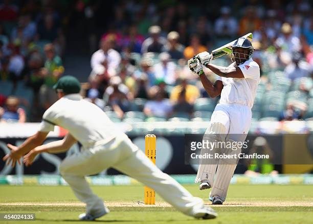 Michael Carberry of England is caught out by David Warner of Australia during day three of the Second Ashes Test match between Australia and England...