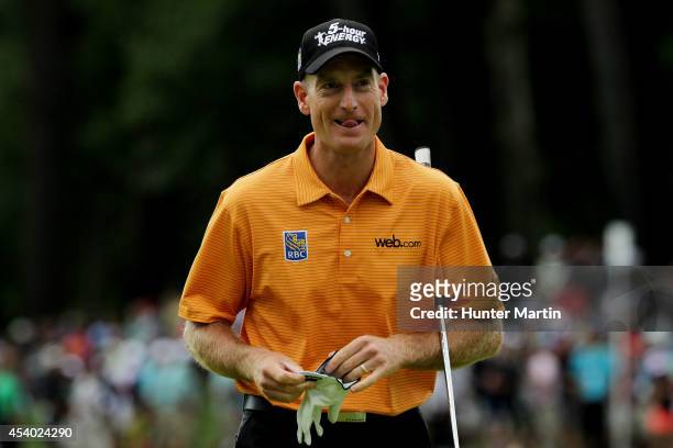 Jim Furyk reacts on the 18th green during the third round of The Barclays at The Ridgewood Country Club on August 23, 2014 in Paramus, New Jersey.