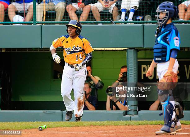 Brandon Green of the Great Lakes Team from Chicago, Illinois celebrates after scoring a run in the fifth inning against the West Team from Las Vegas,...