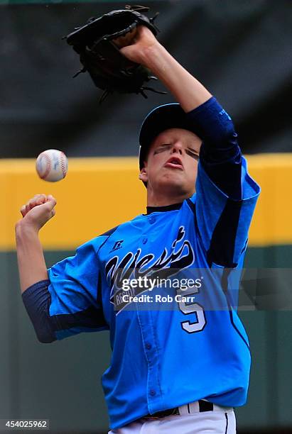 Justin Hausner of of the West Team from Las Vegas, Nevada misses catching a foul ball against the Great Lakes Team from Chicago, Illinois during the...