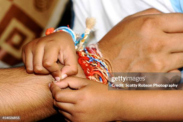 raksha bandhan - friendship bracelet stock pictures, royalty-free photos & images