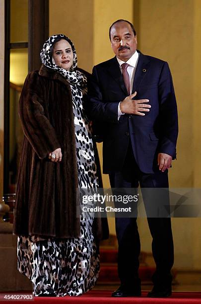 Mauritania's president Mohamed Ould Abdel Aziz and Mauritania first lady Tekber Mint Melainine Ould Ahmed arrive for a diner at the Elysee...