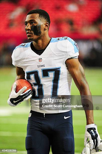 Tommie Campbell of the Tennessee Titans walks on the field during warm ups prior to a preseason game against the Atlanta Falcons at the Georgia Dome...