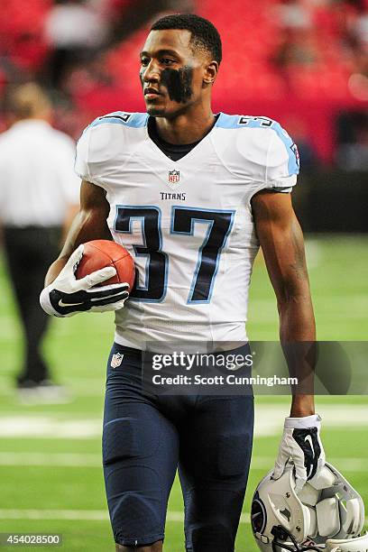 Tommie Campbell of the Tennessee Titans walks on the field during warm ups prior to a preseason game against the Atlanta Falcons at the Georgia Dome...
