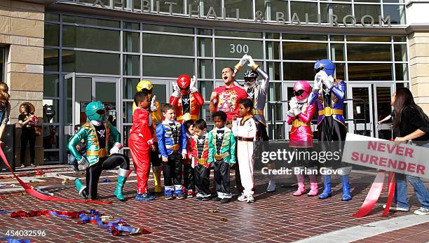 Alex Heartman and Power Rangers attend Make-A-Wish Ribbon-Cutting Ceremony For POWER UP Power MorphiconPasadena Convention Center on August 23, 2014...