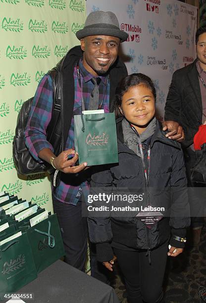 Comedian Wayne Brady and Maile Masako Brady attend KIIS FMs Jingle Ball 2013 gift suite at Staples Center on December 6, 2013 in Los Angeles, CA.