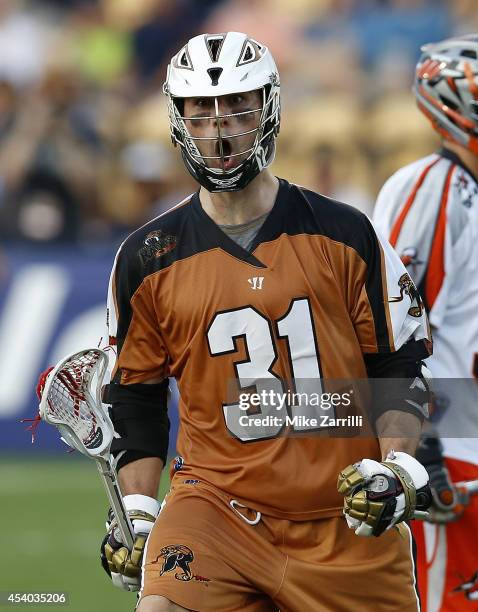 Midfielder John Ranagan of the Rochester Rattlers celebrates after scoring during the 2014 Major League Lacrosse Championship Game against the Denver...