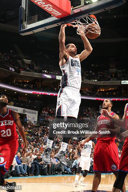 Jeffery Taylor of the Charlotte Bobcats dunks against the Philadelphia 76ers during the game at the Time Warner Cable Arena on December 6, 2013 in...