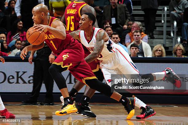 Jarrett Jack of the Cleveland Cavaliers drives to the basket against the Atlanta Hawks on December 6, 2013 at Philips Arena in Atlanta, Georgia. NOTE...