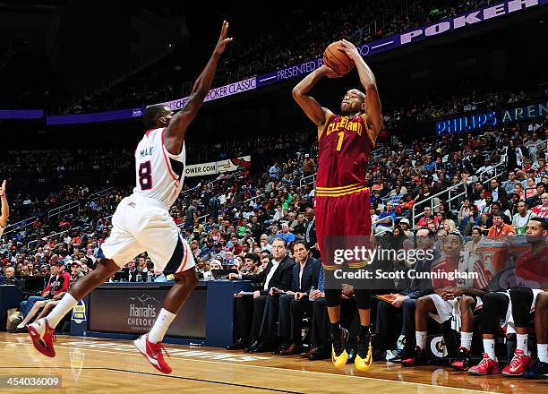 Jarrett Jack of the Cleveland Cavaliers shoots the ball against the Atlanta Hawks on December 6, 2013 at Philips Arena in Atlanta, Georgia. NOTE TO...
