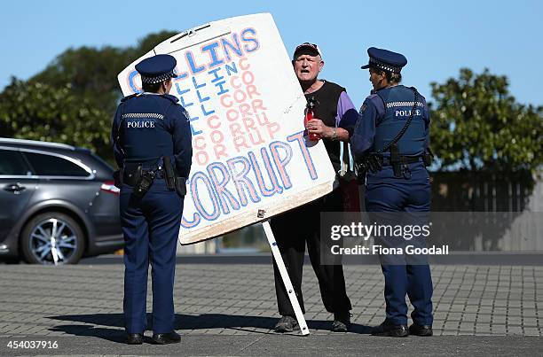 Protesters are moved to the footpath by police outside the Vodafone Events Centre as they wait for the arrival of Leader of the National Party, John...