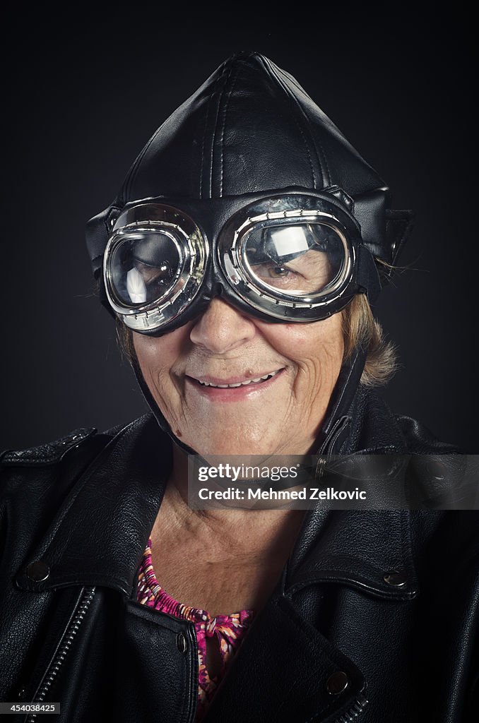 Smiling Senior Woman With goggles