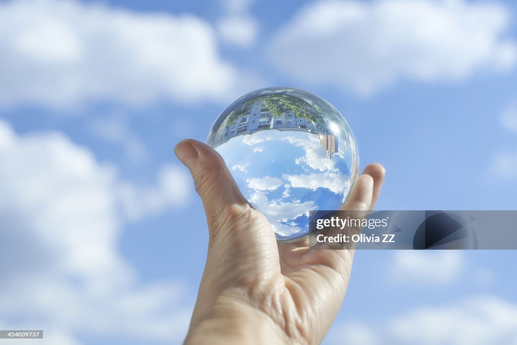 Crystal ball under the clear sky