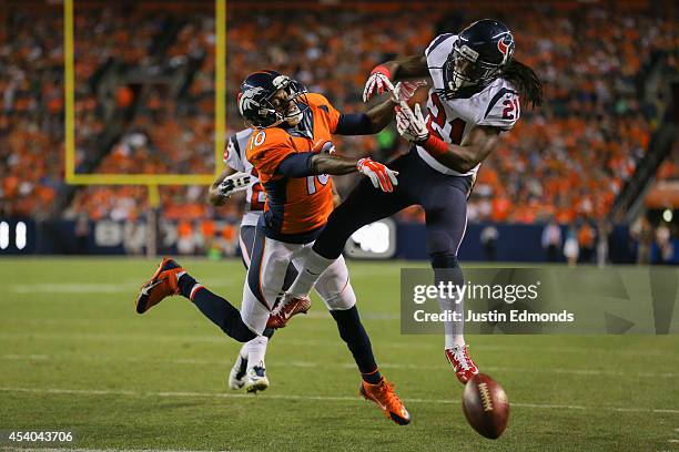 Free safety Kendrick Lewis of the Houston Texans breaks up a pass intended for wide receiver Emmanuel Sanders of the Denver Broncos during a...