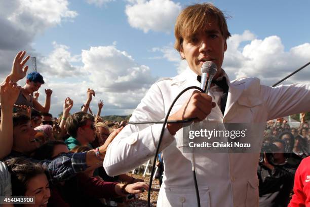 Howlin' Pelle Almqvist of The Hives performs on Day 2 of the Reading Festival at Richfield Avenue on August 23, 2014 in Reading, England.