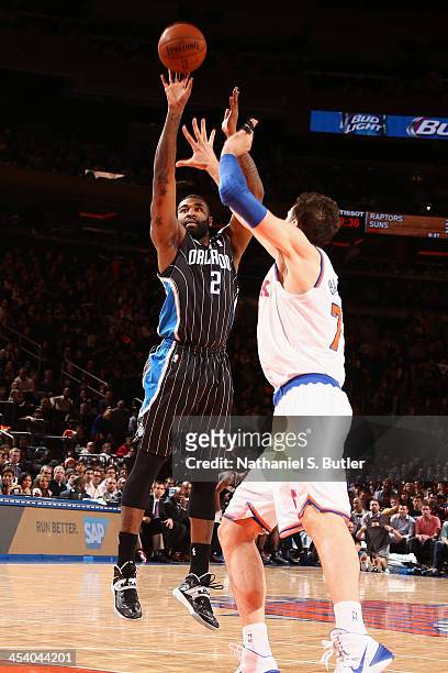 Kyle O'Quinn of the Orlando Magic shoots against the New York Knicks during a game at Madison Square Garden in New York City on December 6, 2013....