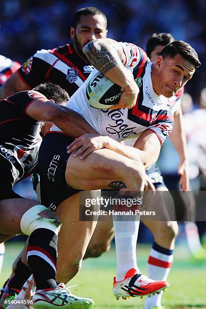 Sonny Bill Williams of the Roosters charges forward during the round 24 NRL match between the New Zealand Warriors and the Sydney Roosters at Mt...