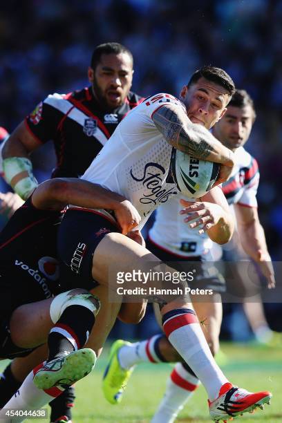 Sonny Bill Williams of the Roosters charges forward during the round 24 NRL match between the New Zealand Warriors and the Sydney Roosters at Mt...