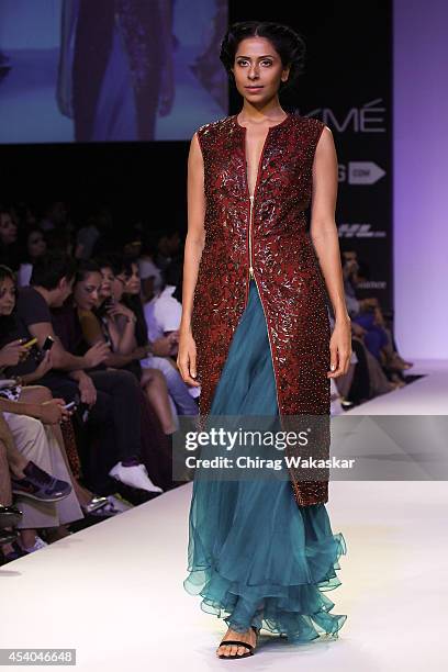 Model showcases designs by Soup by Sougat Paul during day 4 of Lakme Fashion Week Winter/Festive 2014 at The Palladium Hotel on August 23, 2014 in...