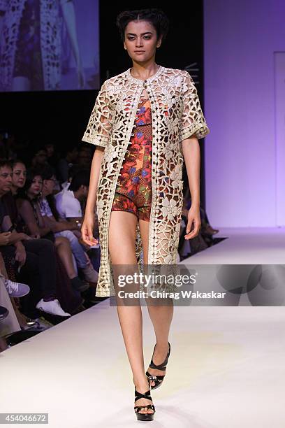 Model showcases designs by Soup by Sougat Paul during day 4 of Lakme Fashion Week Winter/Festive 2014 at The Palladium Hotel on August 23, 2014 in...