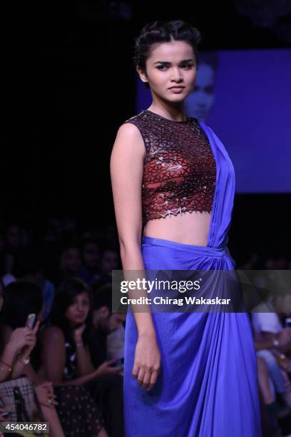 Model showcases designs by Soup by Sougat Paul during day 4 of Lakme Fashion Week Winter/Festive 2014 at The Palladium Hotel on August 23, 2014 in...