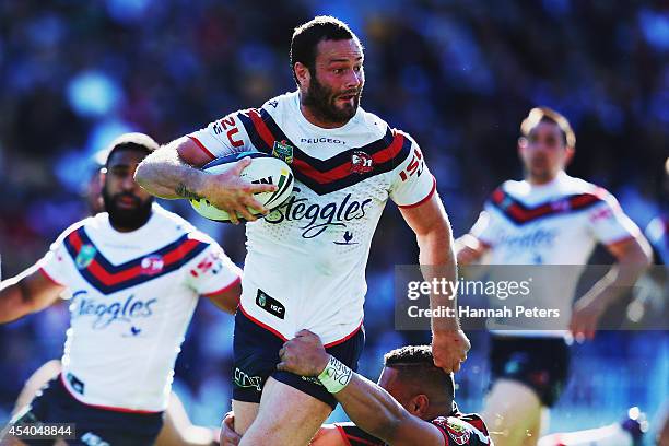 Boyd Cordner of the Roosters makes a break during the round 24 NRL match between the New Zealand Warriors and the Sydney Roosters at Mt Smart Stadium...