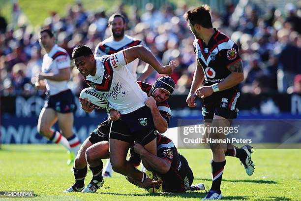 Daniel Tupou of the Roosters charges forward during the round 24 NRL match between the New Zealand Warriors and the Sydney Roosters at Mt Smart...