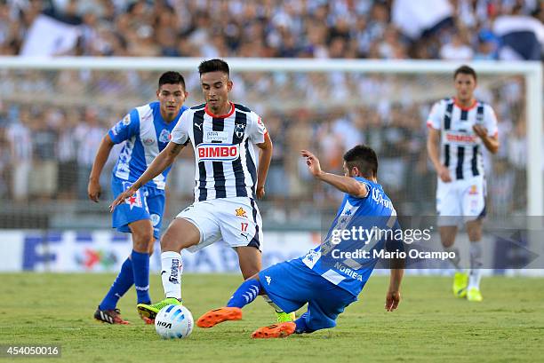Jesus Zavala of Monterrey fights for the ball with Luis Noriega of Puebla during a match between Monterrey and Puebla as part of 6th round Apertura...