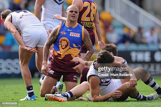 Ashley McGrath of the Lions looks dejected during the round 22 AFL match between the Brisbane Lions and the Fremantle Dockers at The Gabba on August...