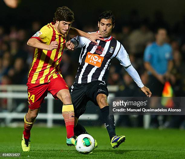 Fede of Cartagena competes for the ball with Sergi Roberto of Barcelona during the Copa del Rey, Round of 32 match between FC Cartagena and FC...