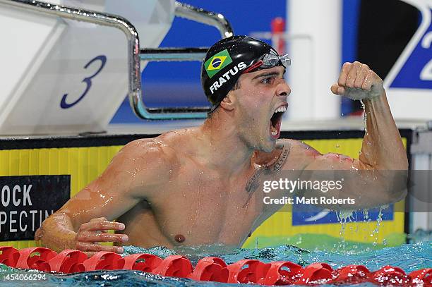 Burno Fratus of Brazil celebrates winning the Men's 50m Freestyle Final during day four of the 2014 Pan Pacific Championships at Gold Coast Aquatics...